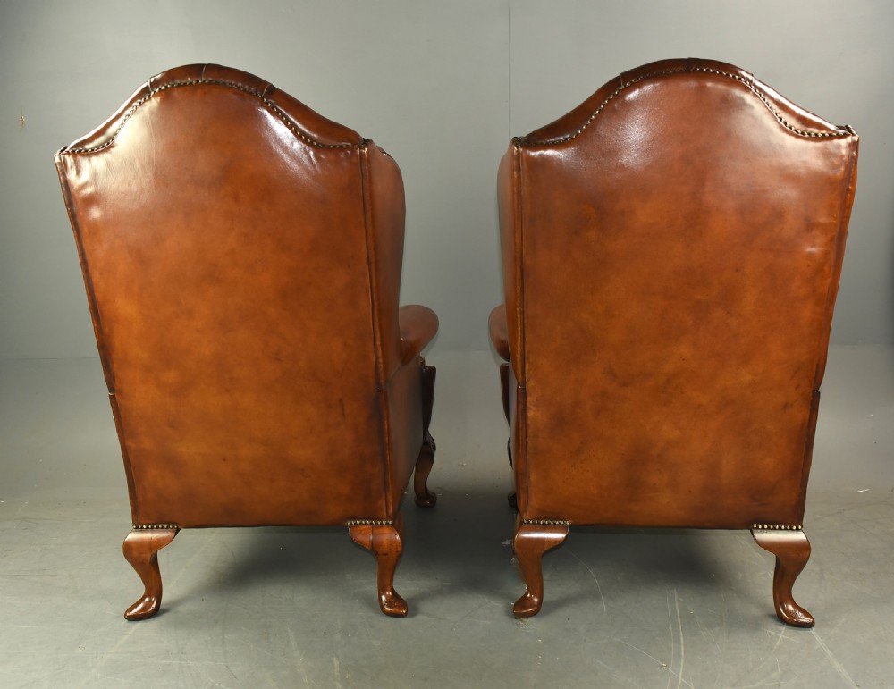 Large pair of leather wing chairs  View IX