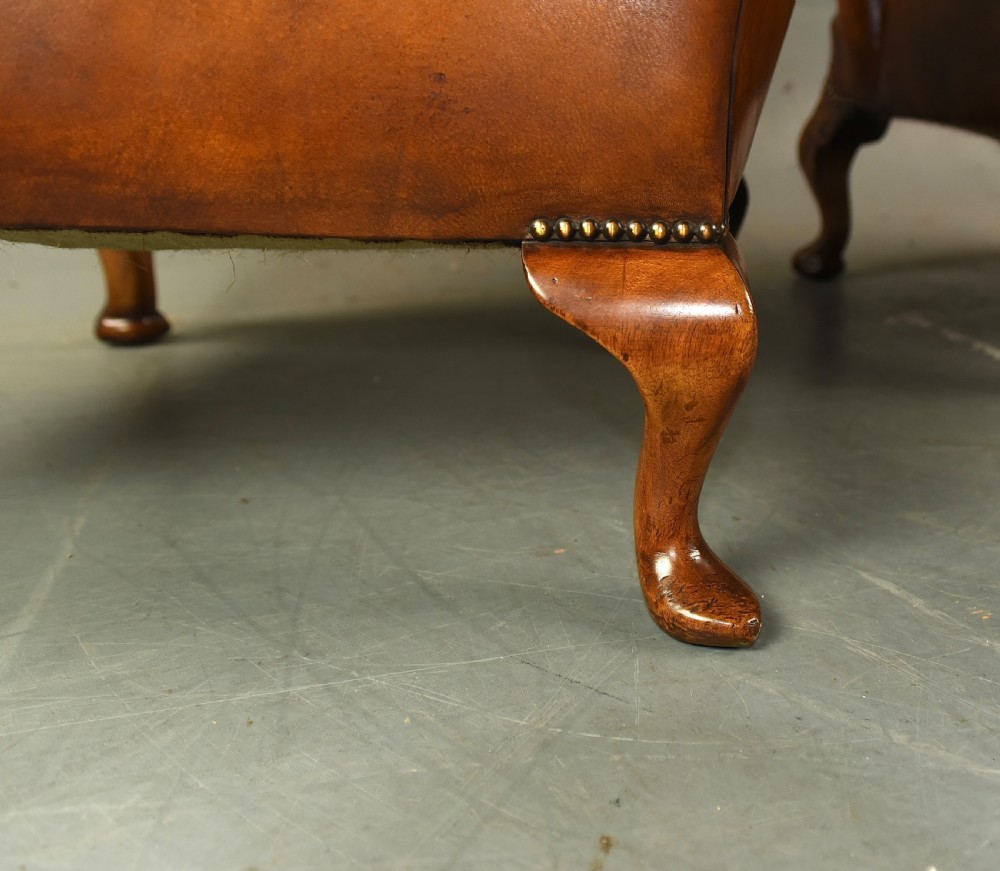 Large pair of leather wing chairs  View X