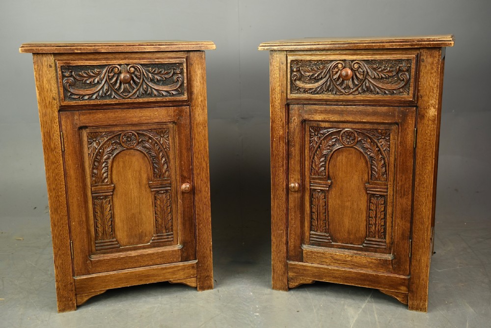Pair of carved oak bedside cabinets 