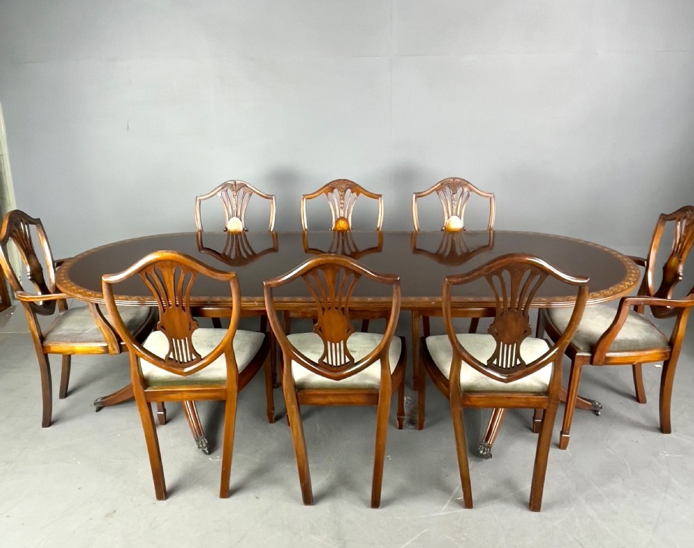 Regency style dining table and eight chairs 
