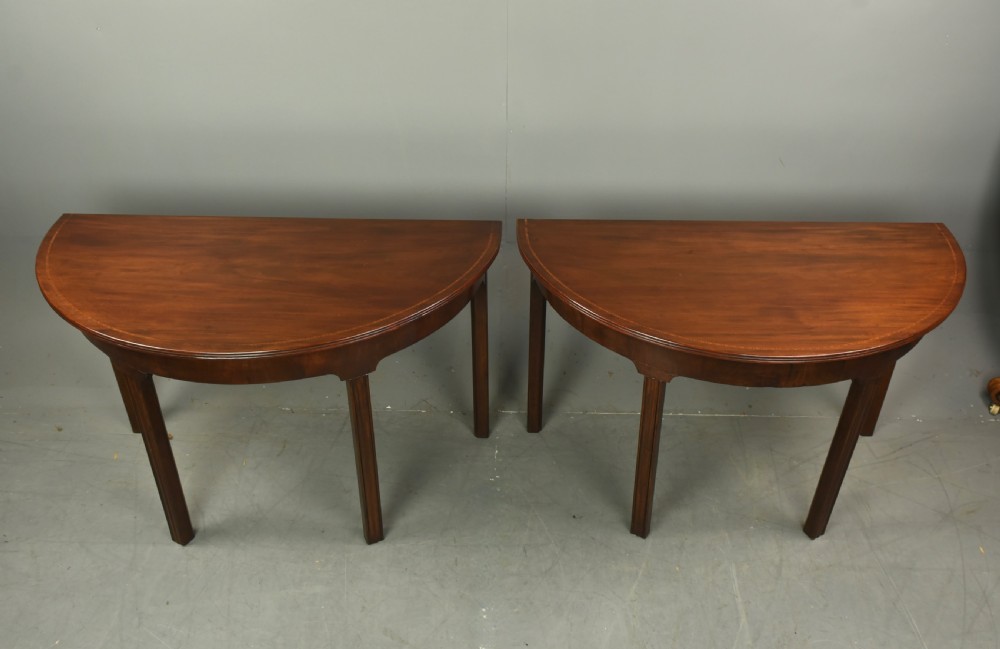 Pair of Georgian mahogany demi lune console tables  View III