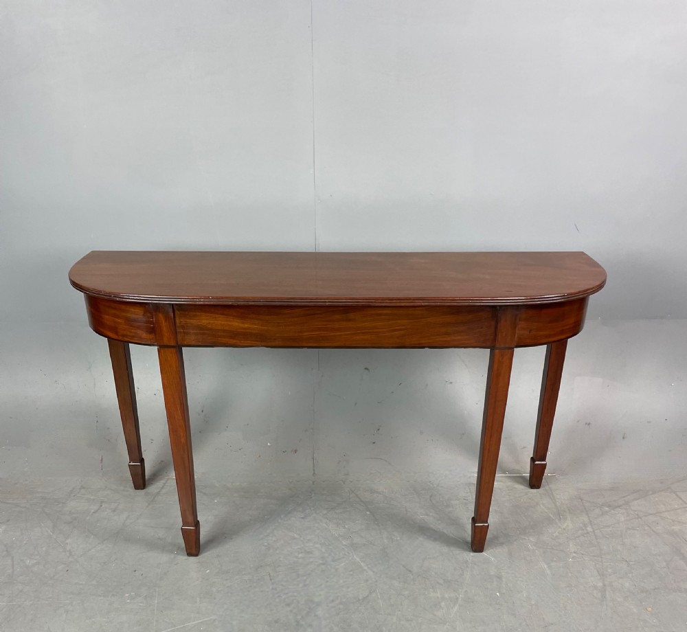 pair of Georgian mahogany console tables  View II