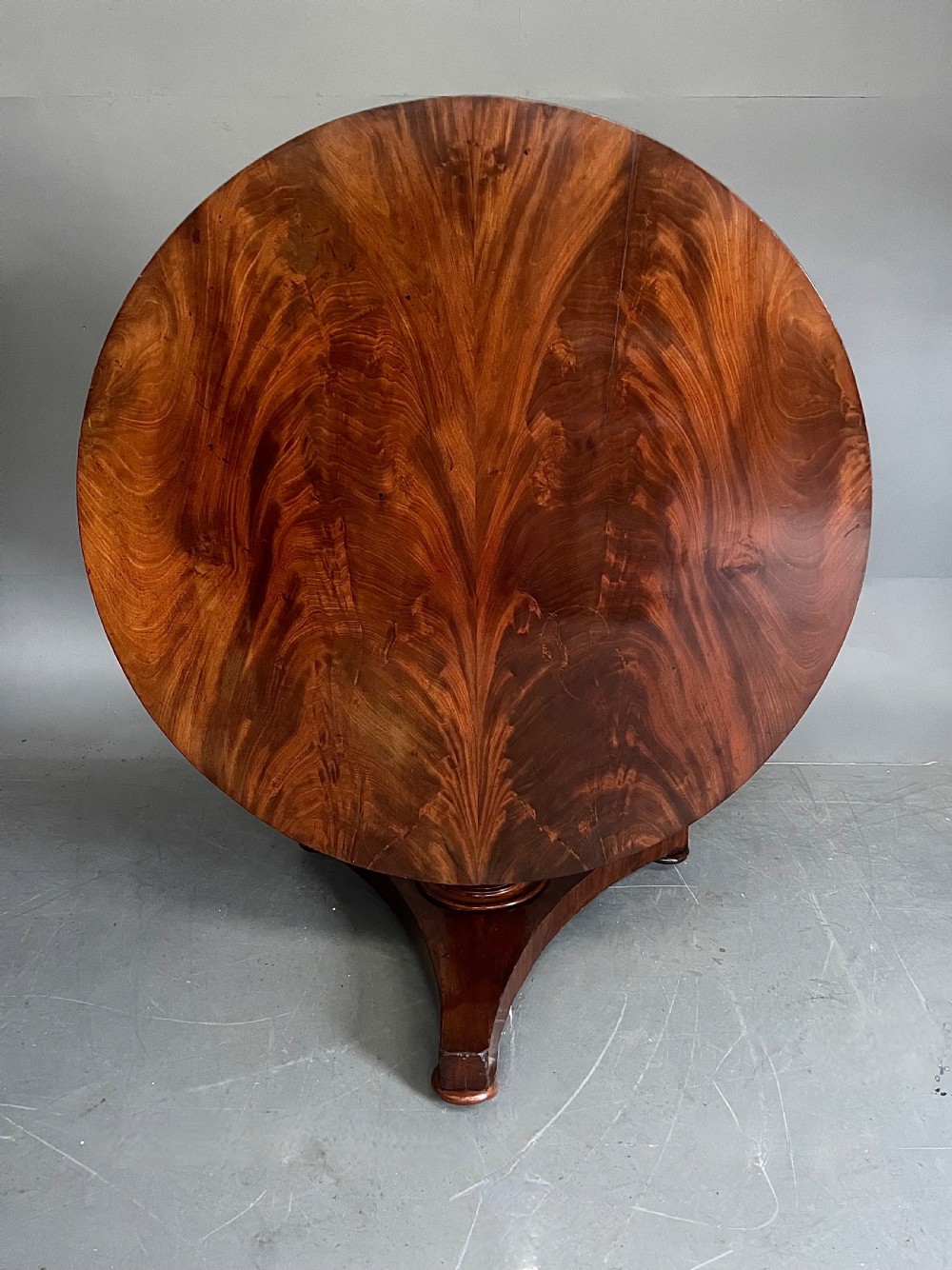 Round Victorian flame mahogany dining table 