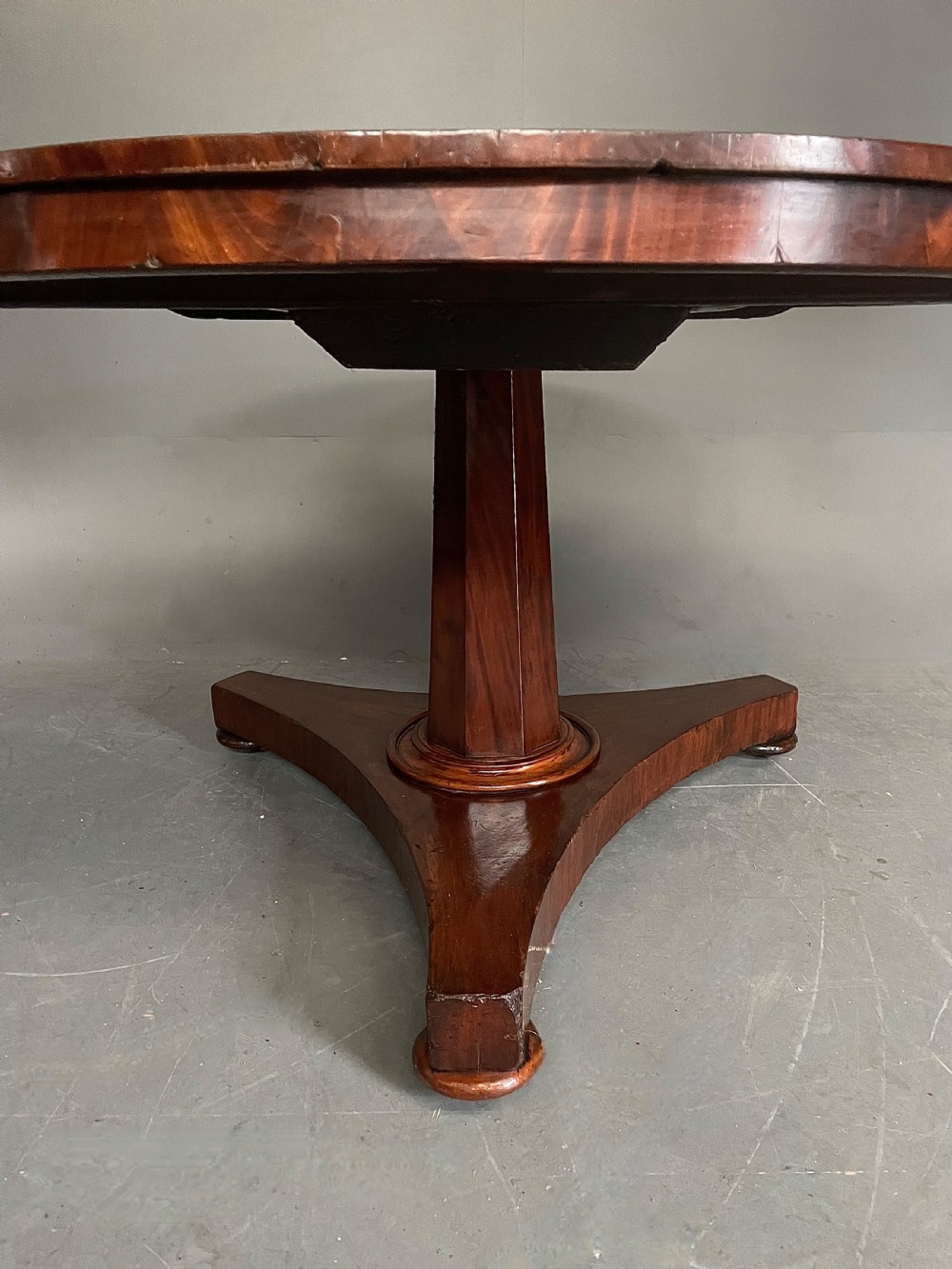 Round Victorian flame mahogany dining table  View IV