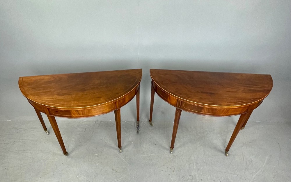 Pair of Georgian mahogany demi lune console tables  View III