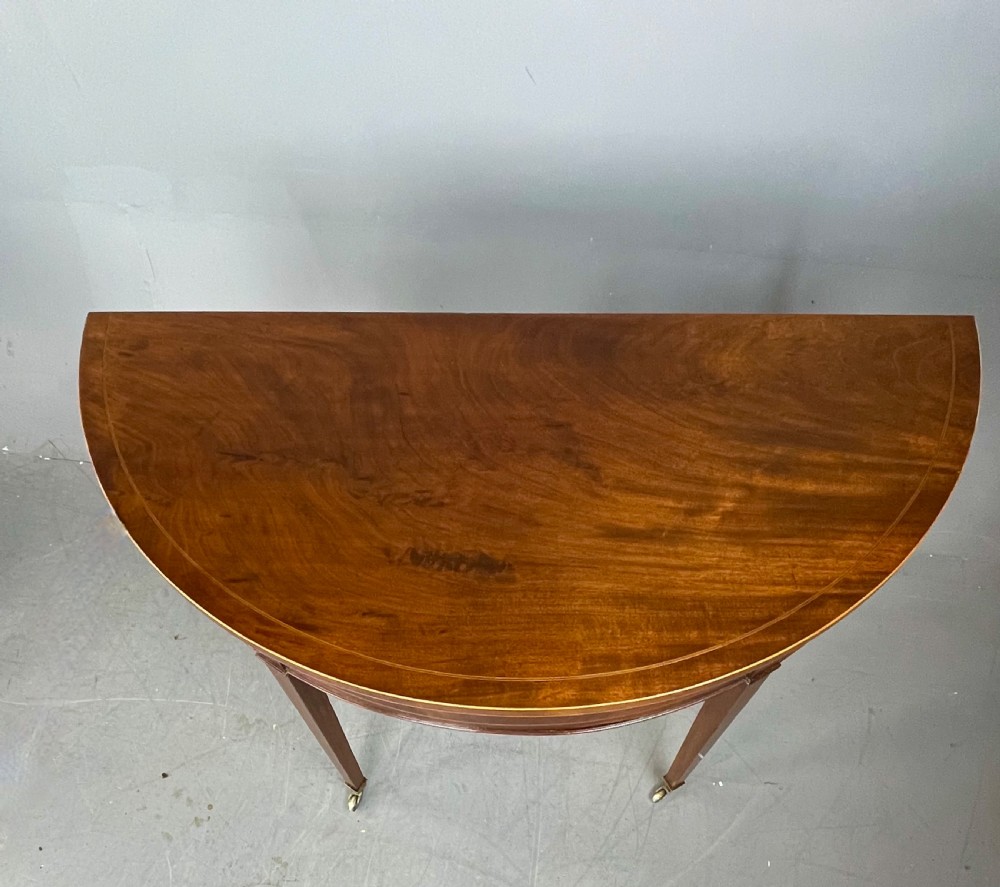 Pair of Georgian mahogany demi lune console tables  View V