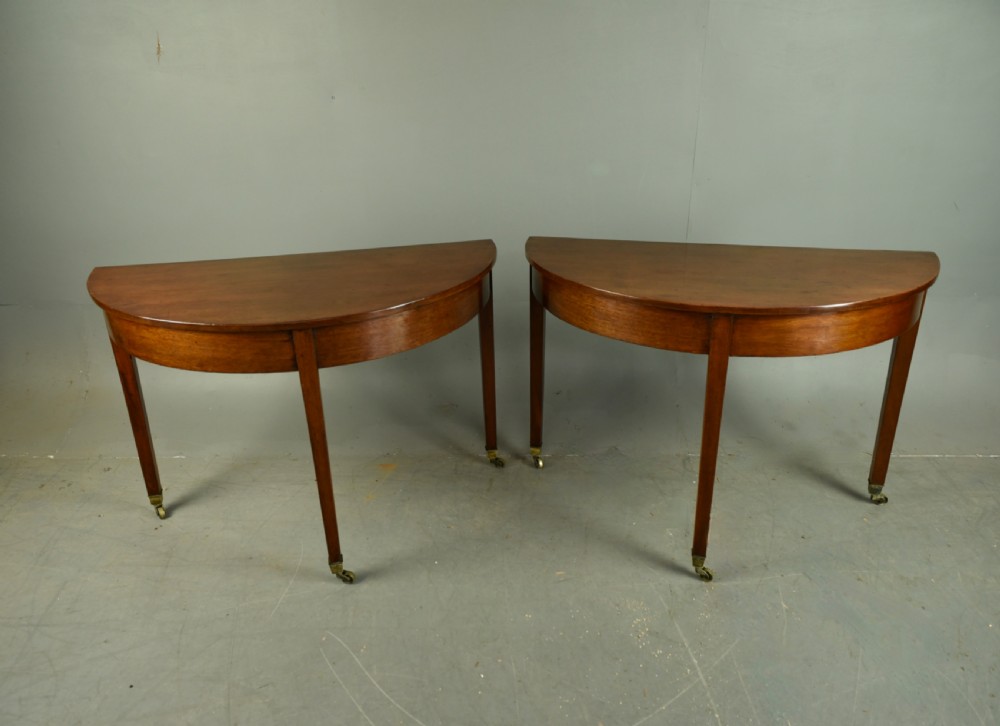 Pair of Georgian mahogany Demi lune console tables 