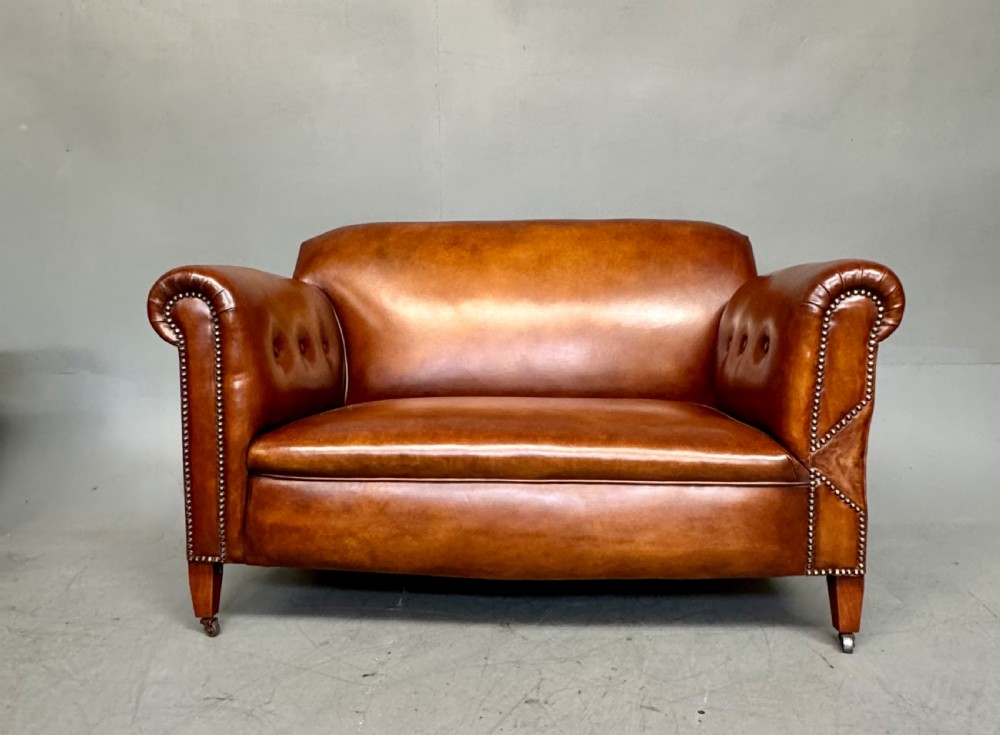 Victorian leather drop arm sofa 