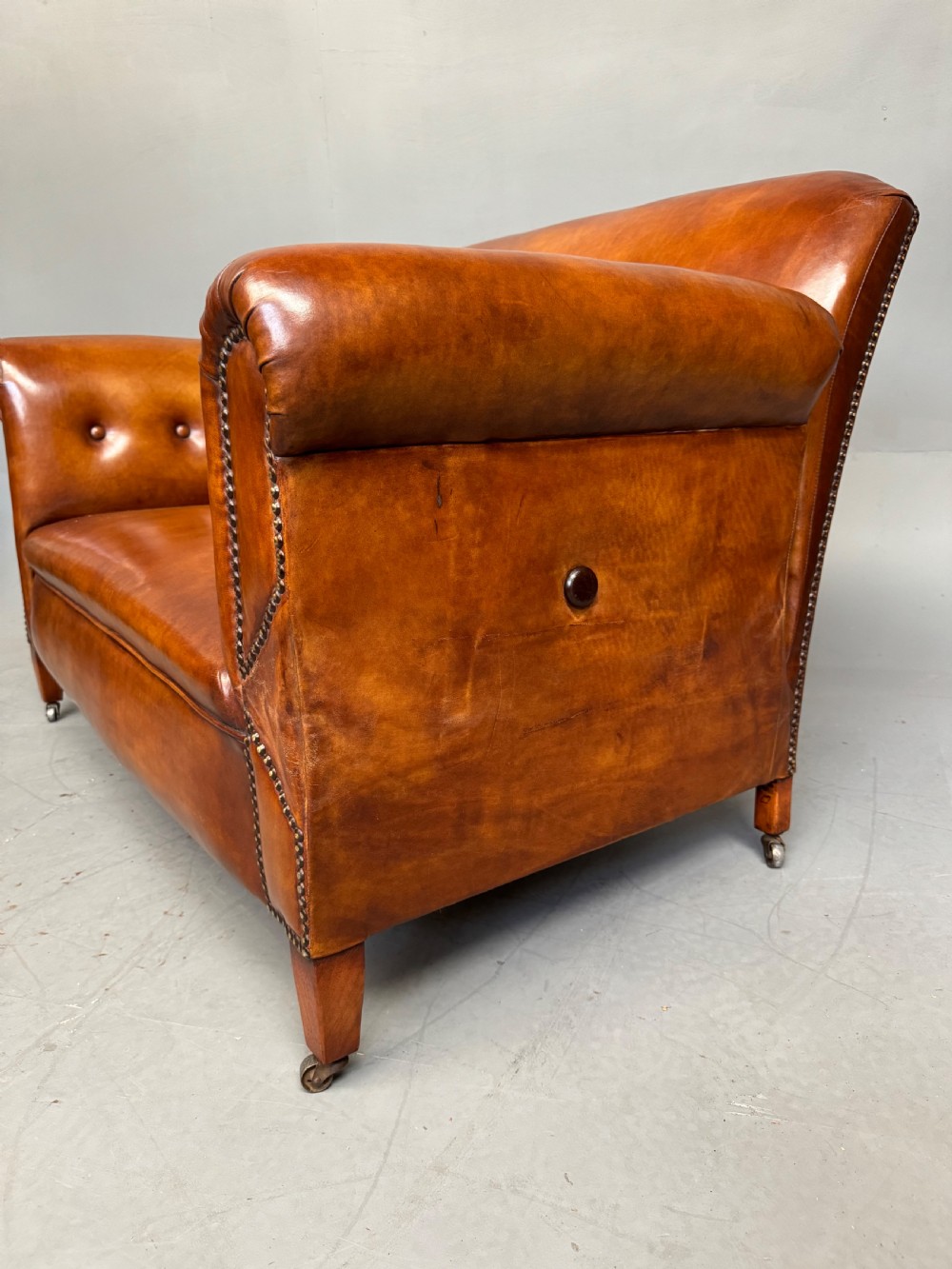 Victorian leather drop arm sofa  View VIII