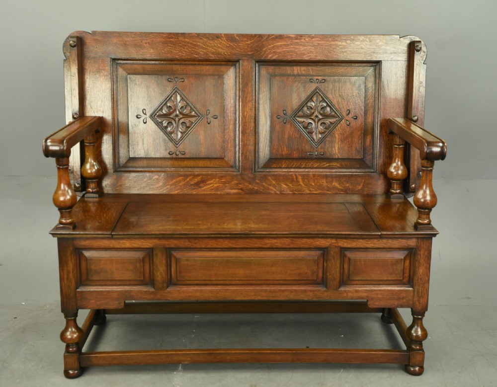carved oak monks bench 