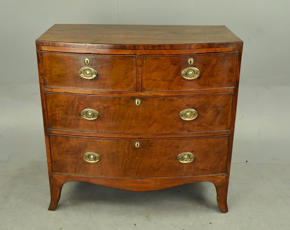 Small Georgian mahogany bow front chest of drawers 