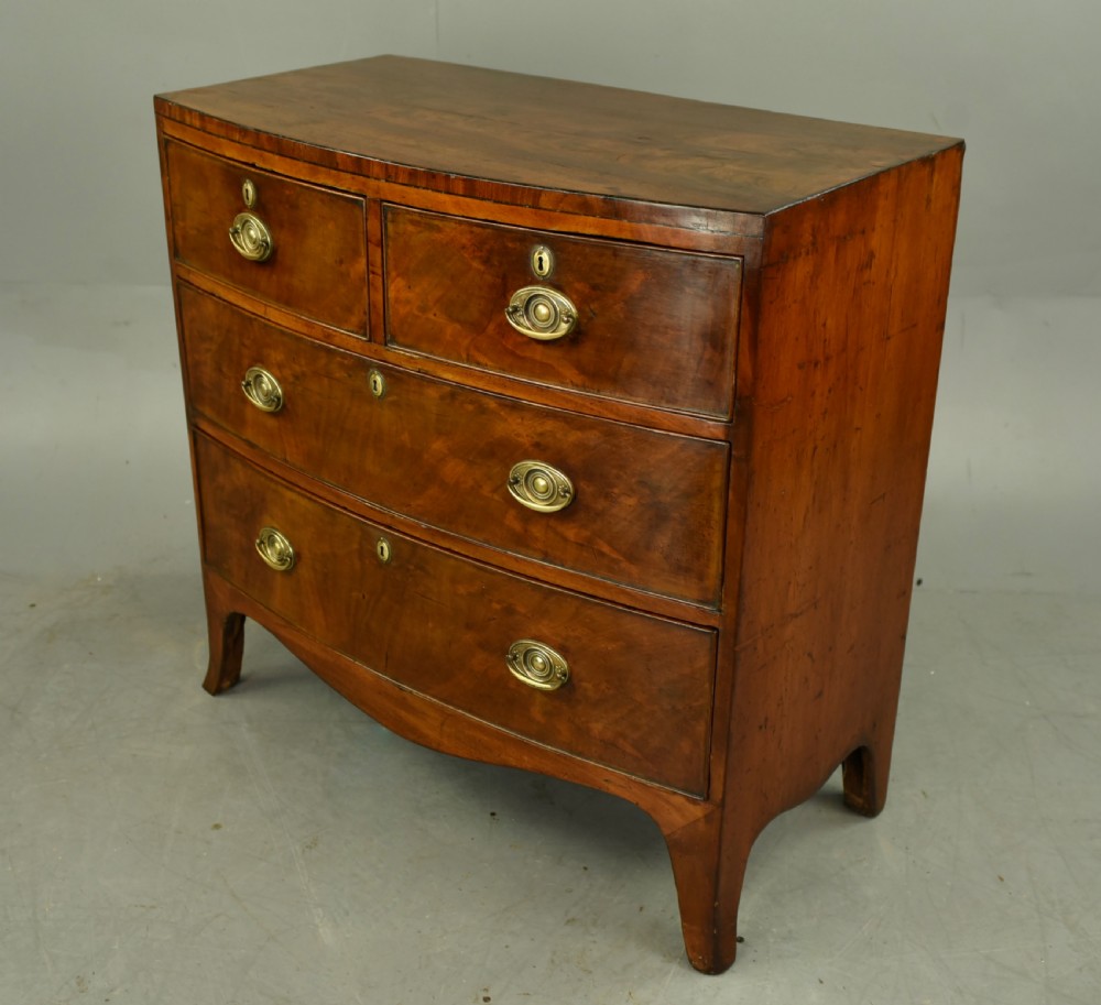 Small Georgian mahogany bow front chest of drawers  View II