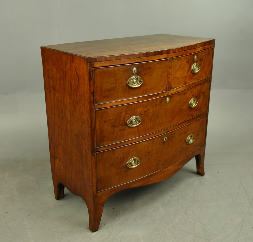 Small Georgian mahogany bow front chest of drawers  View III