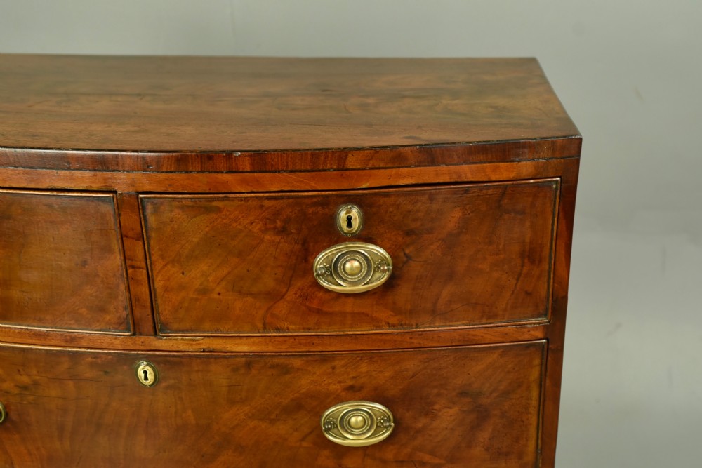 Small Georgian mahogany bow front chest of drawers  View IV