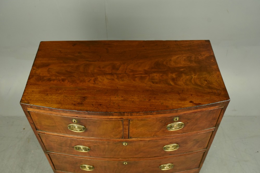 Small Georgian mahogany bow front chest of drawers  View V