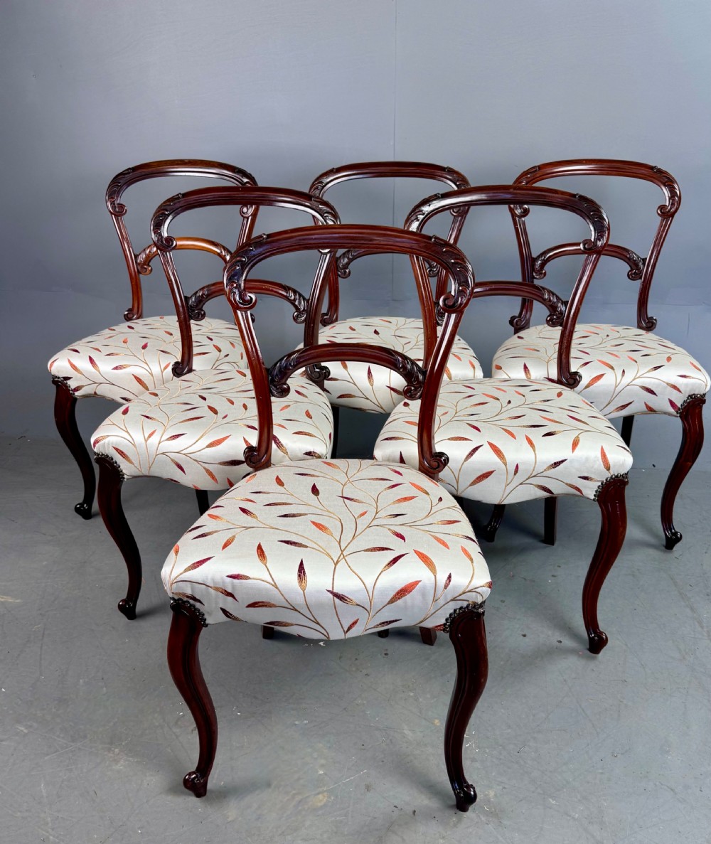 set of six rosewood dining chairs 