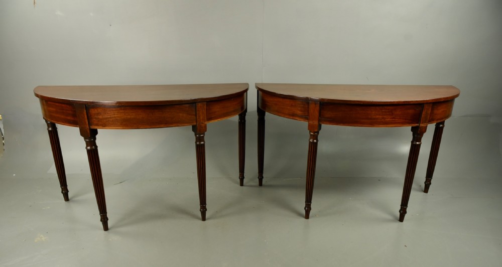 Pair of Georgian mahogany Demi lune console tables 