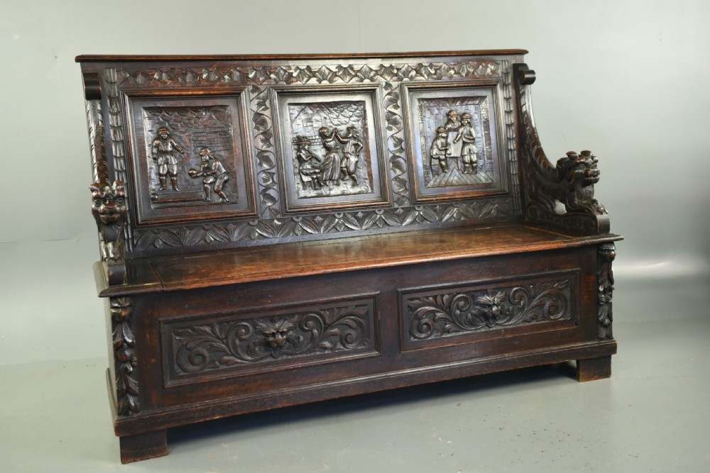 Antique carved oak settle  View II