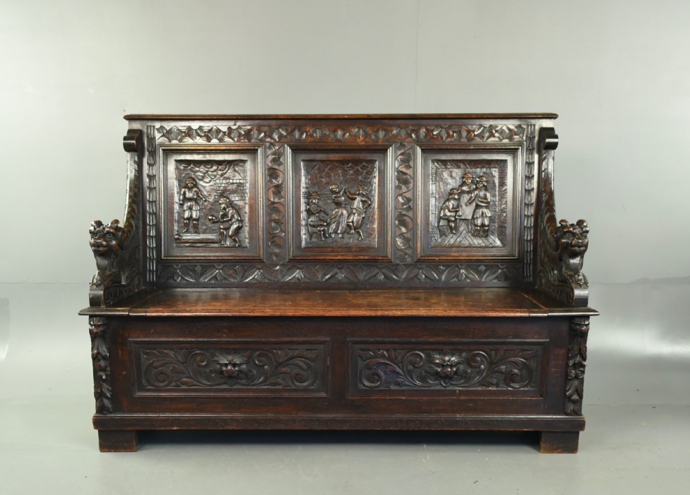 Antique carved oak settle  View III