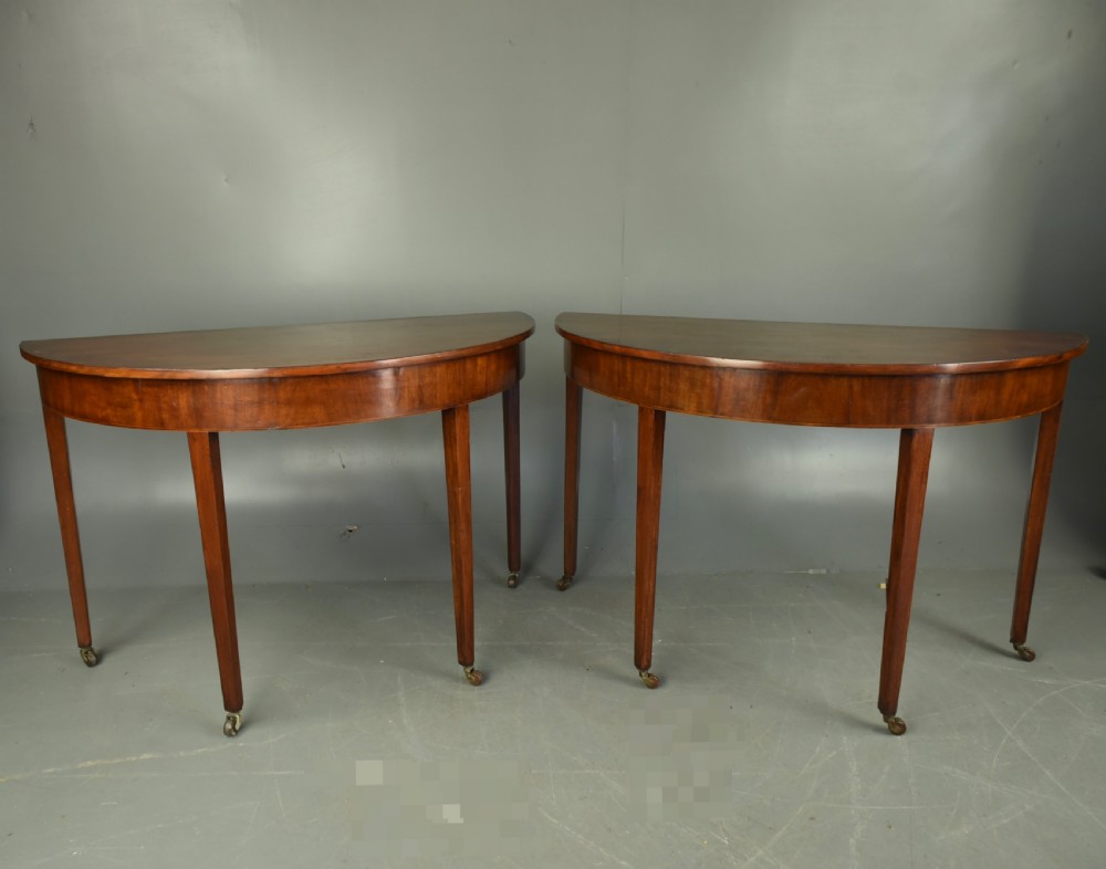 Pair of Georgian Demi lune console tables 