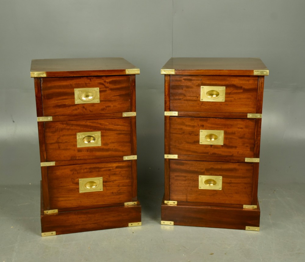 Pair of victorian mahogany campaign bedside chests of drawers 