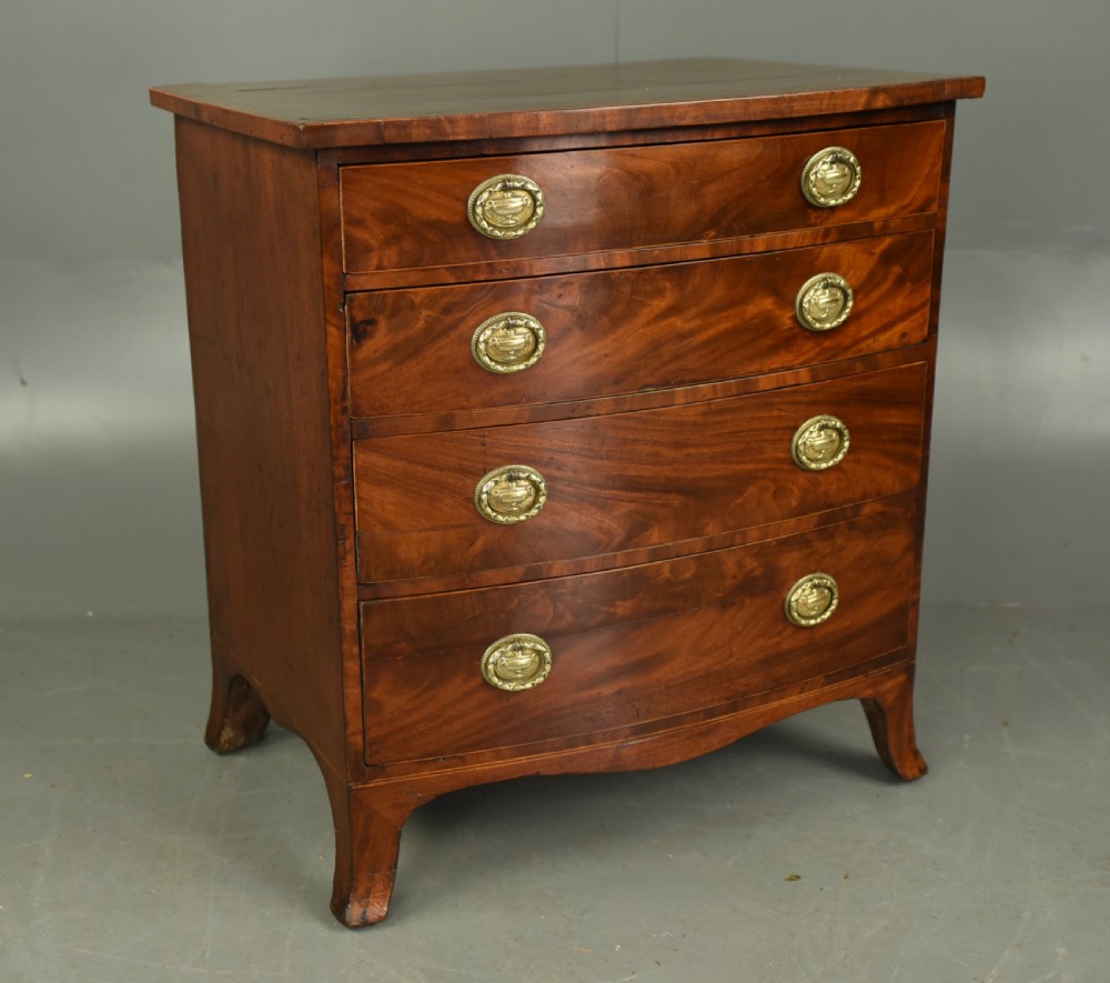 Small Georgian mahogany bow front chest of drawers  View II