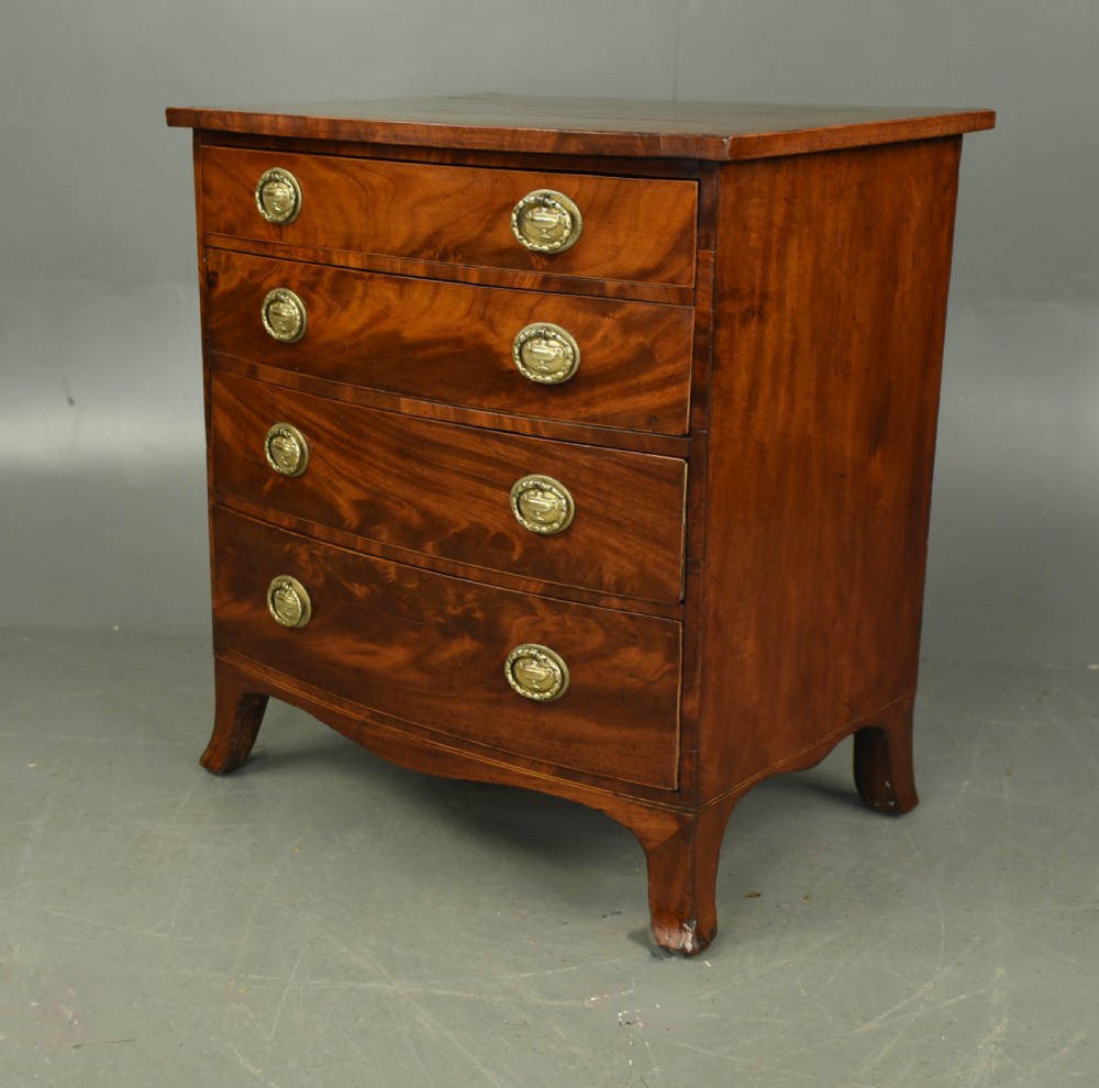 Small Georgian mahogany bow front chest of drawers  View III