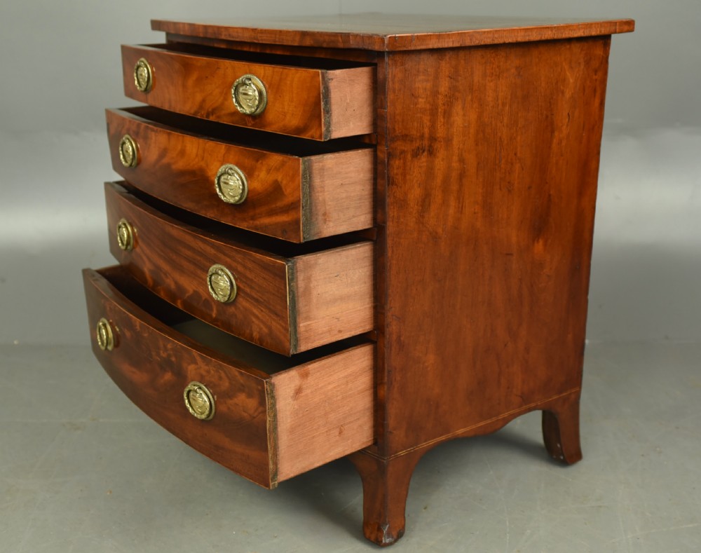 Small Georgian mahogany bow front chest of drawers  View VI