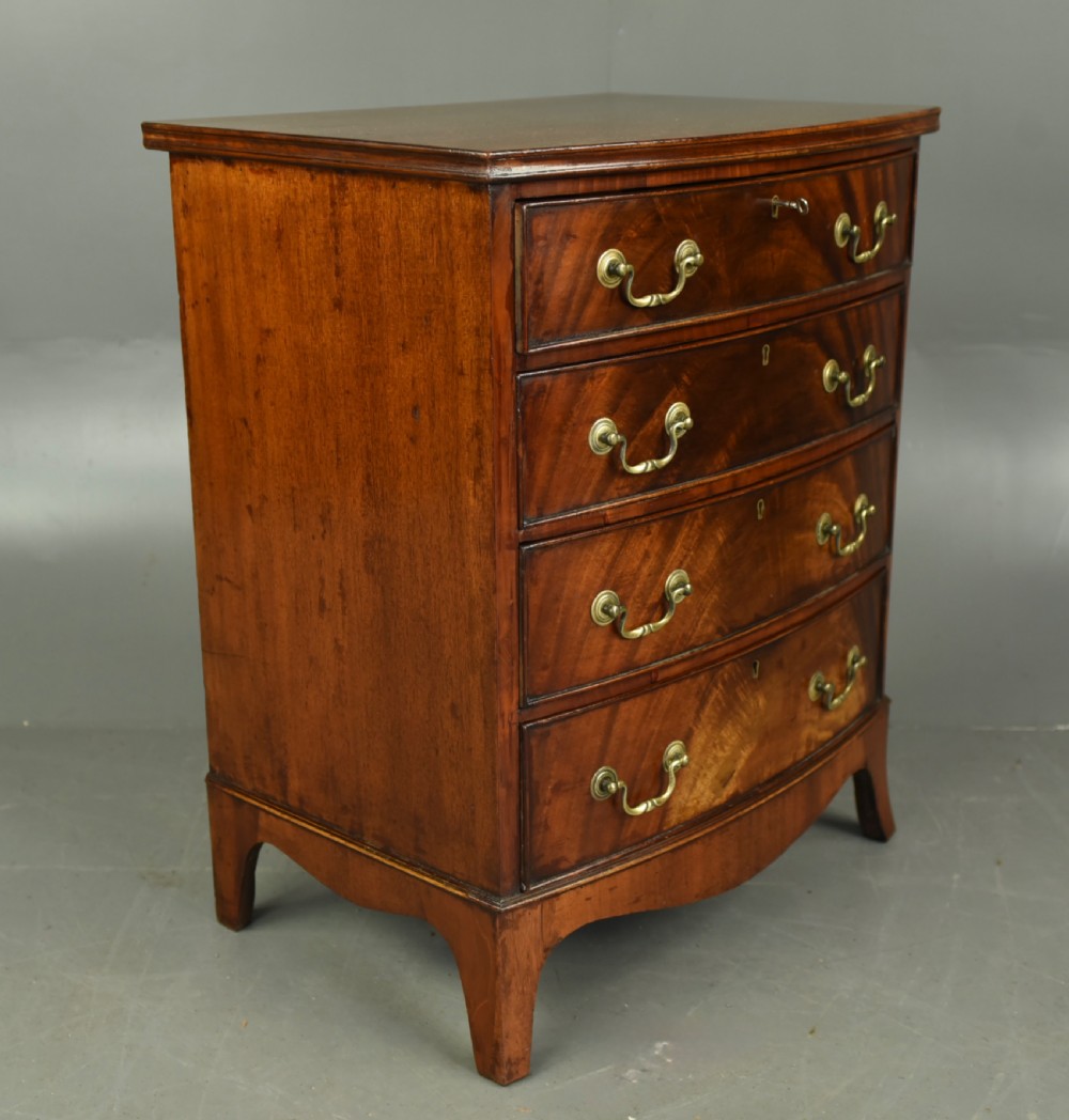 small Antique mahogany bow front chest of drawers  View II