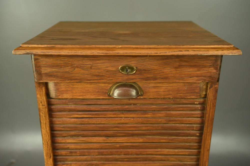 Antique oak tambour front file cabinet  View VI