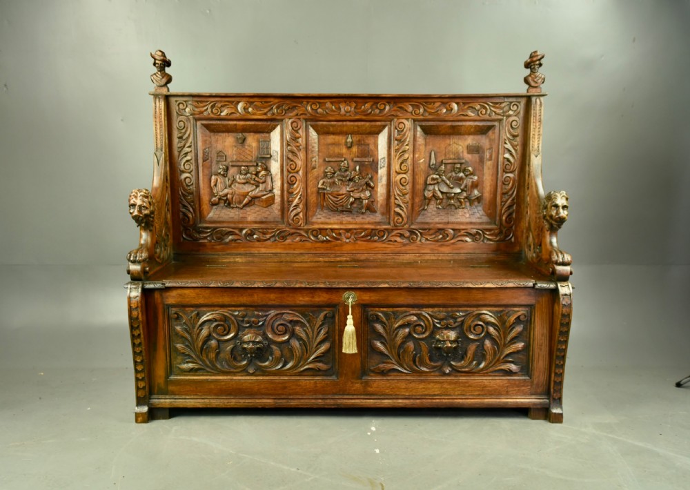 Large carved oak bench 