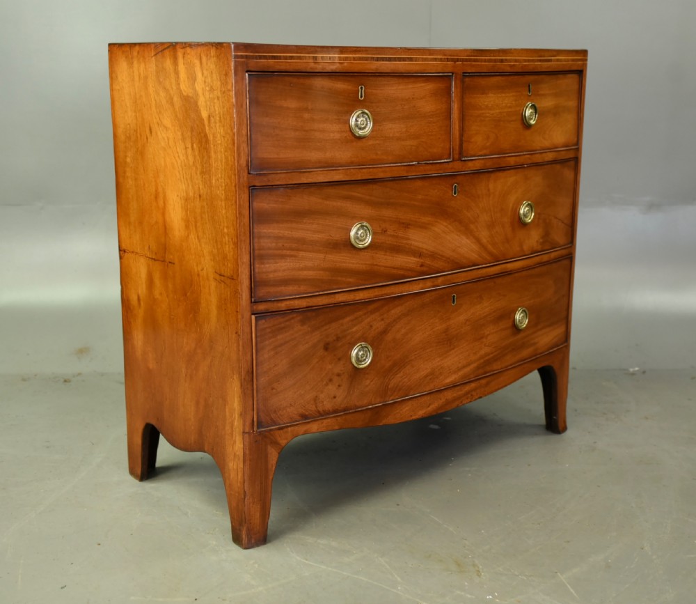 Small Georgian mahogany bow front chest of drawers 