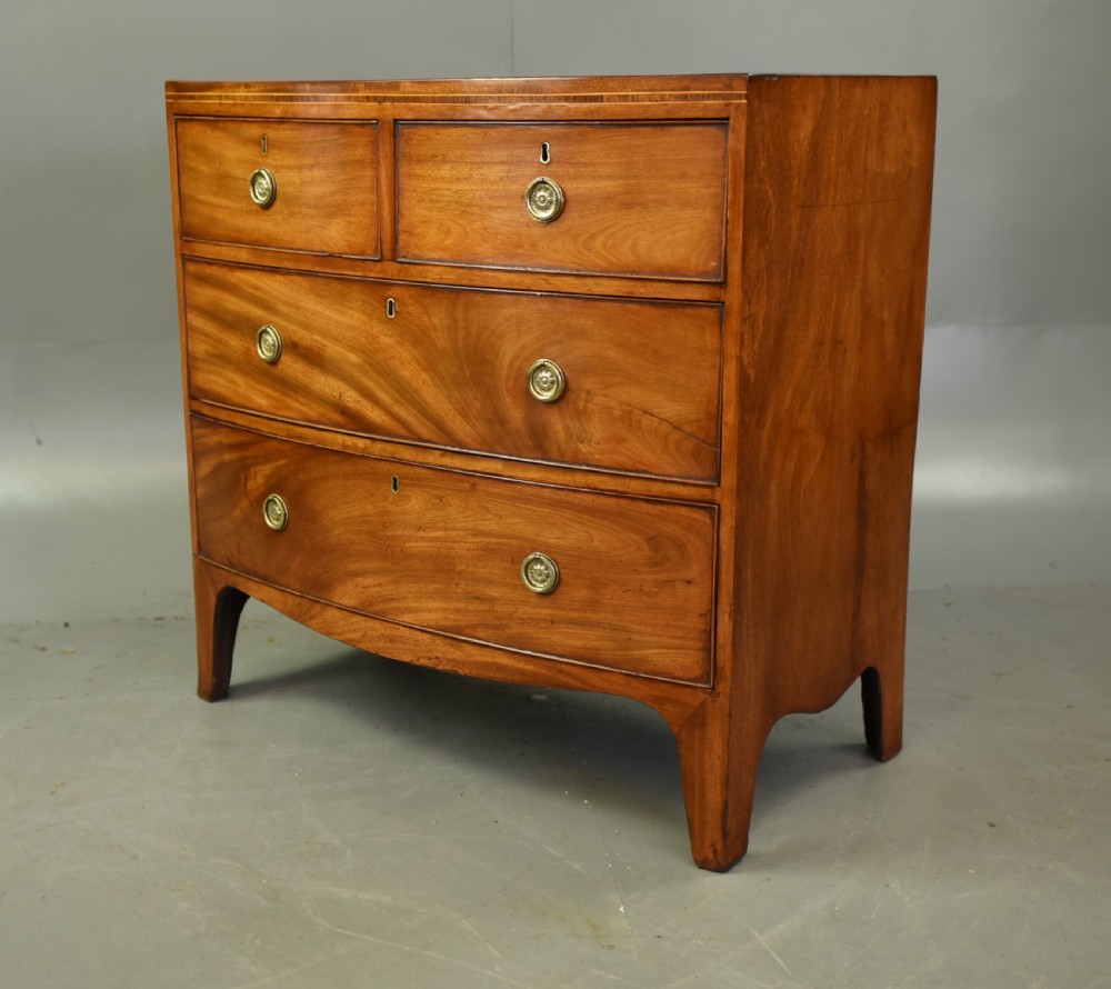 Small Georgian mahogany bow front chest of drawers  View III