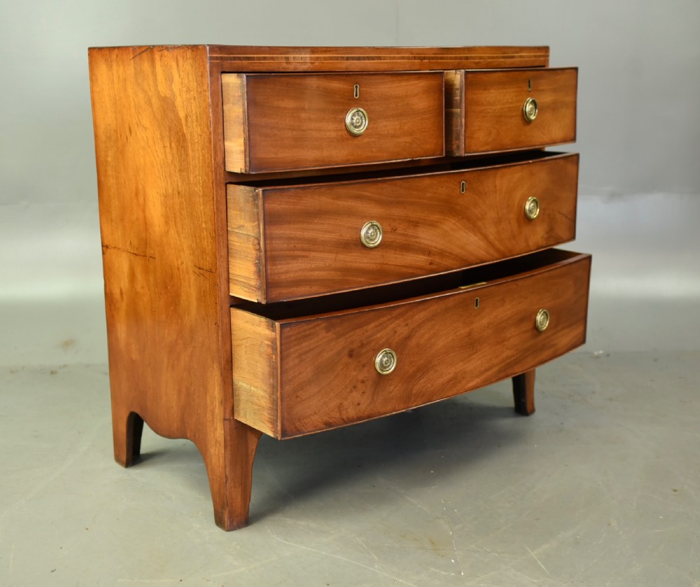 Small Georgian mahogany bow front chest of drawers  View V