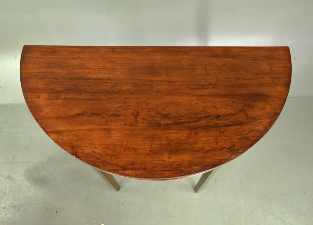 Pair of Georgian mahogany demi lune console tables  View III