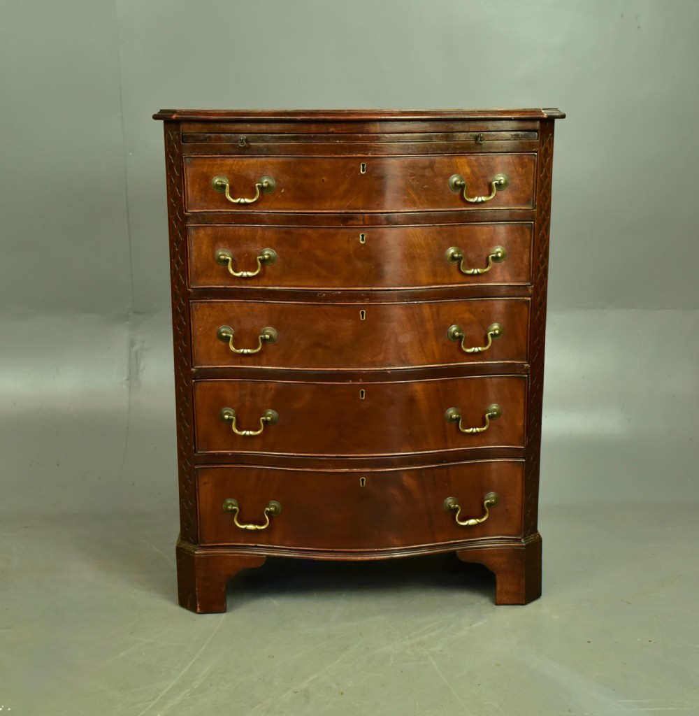 Antique mahogany serpentine chest of drawers 