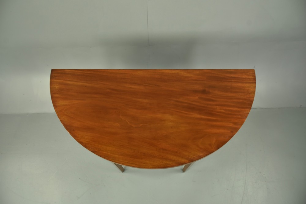 pair of Georgian mahogany demi lune console tables  View V