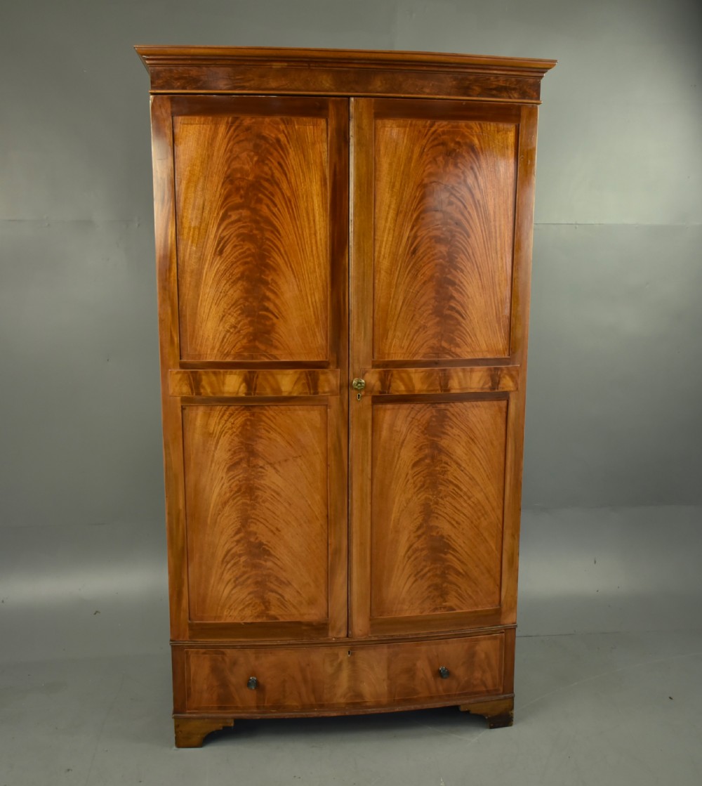 Antique flame mahogany double wardrobe 