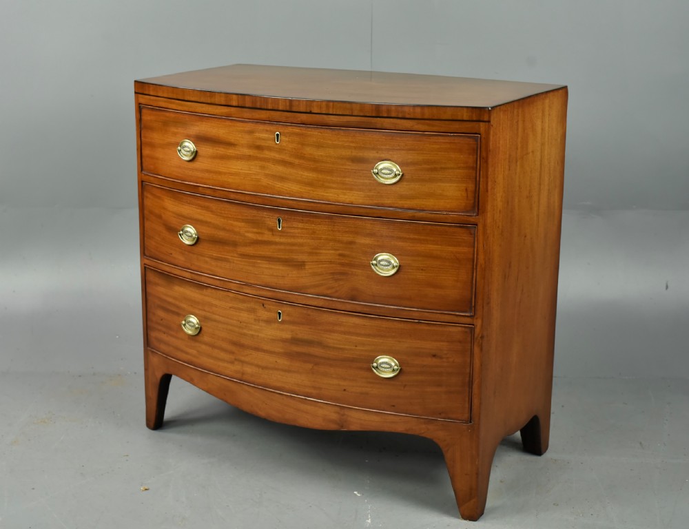 small Georgian mahogany Bowfront chest of drawers  View II