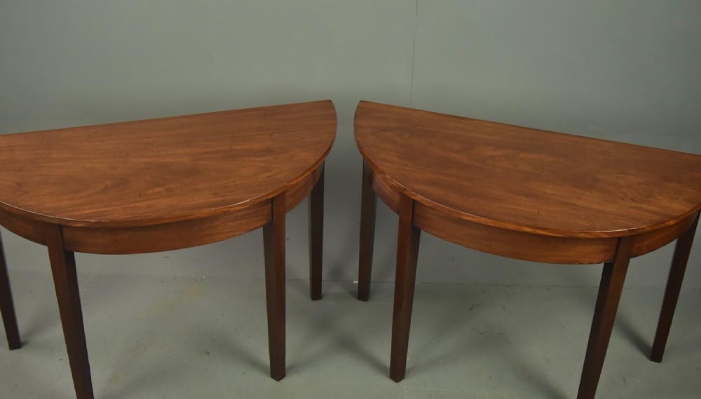 Pair of Georgian mahogany demi lune console table  View II