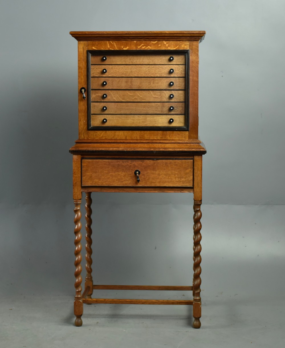 Oak collectors cabinet 