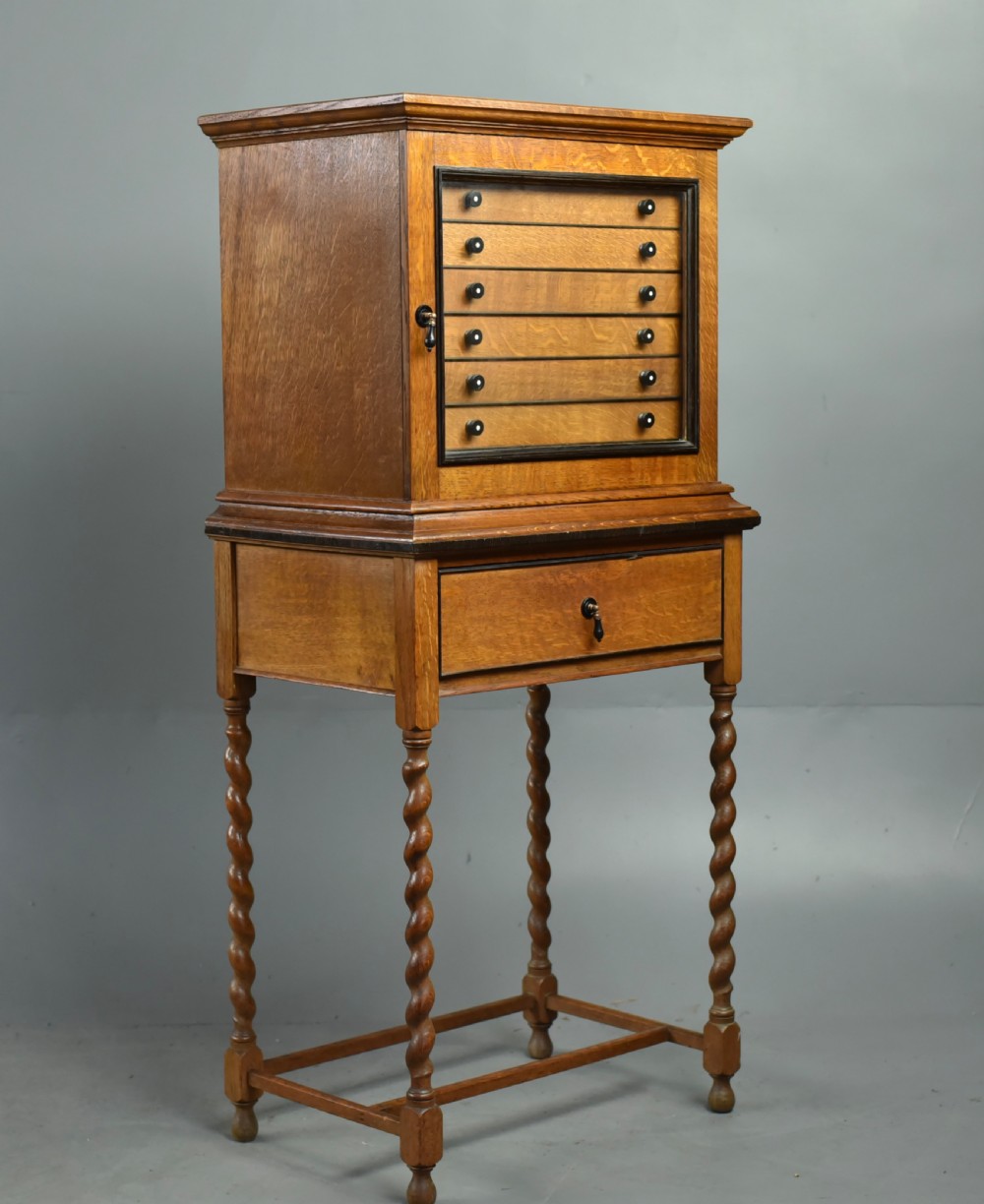 Oak collectors cabinet  View III