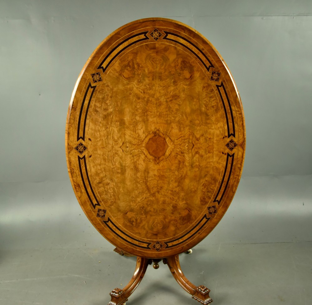 Victorian inlaid walnut oval centre table  View II