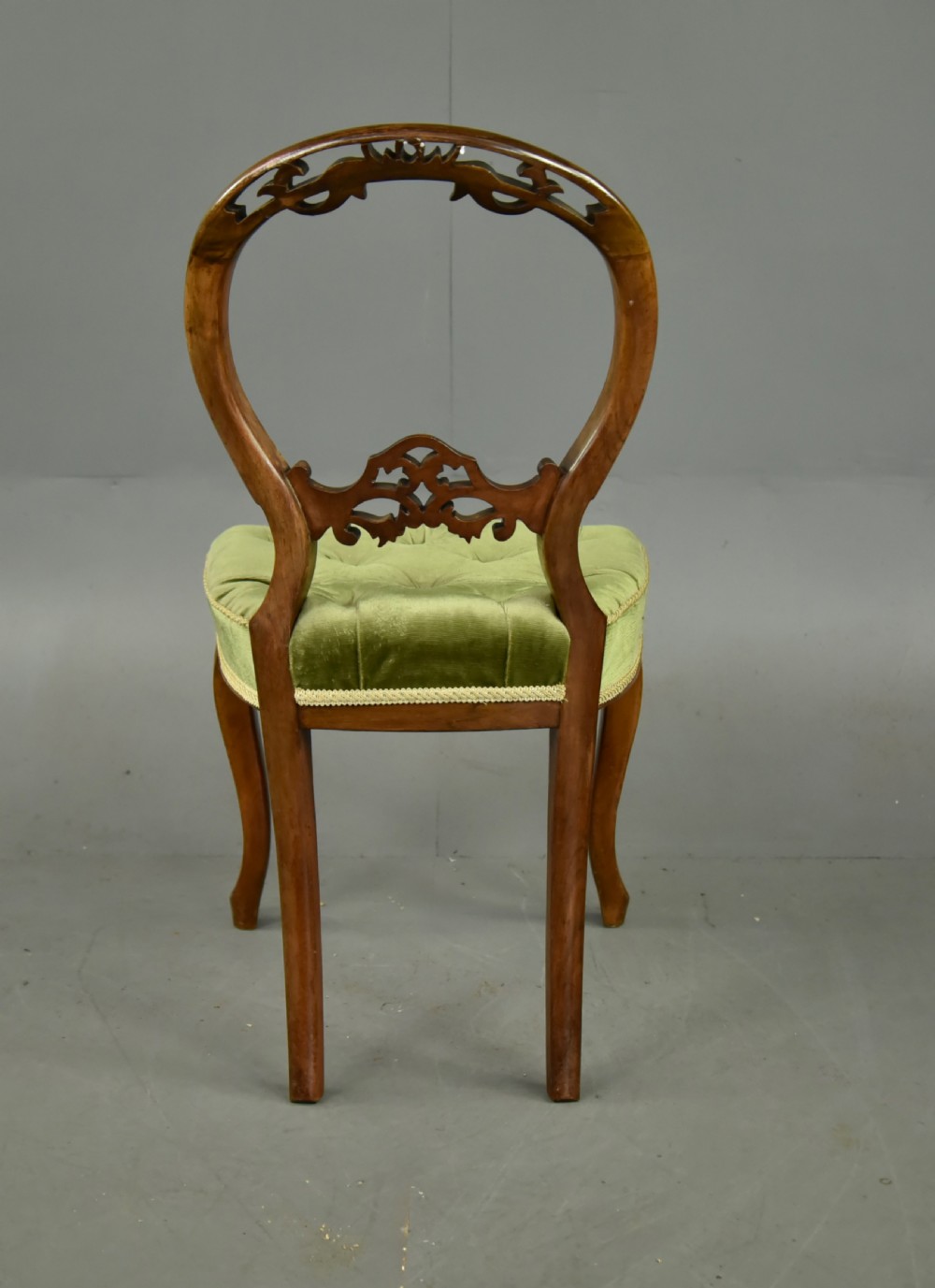 set of six Victorian walnut balloon back chairs  View VI