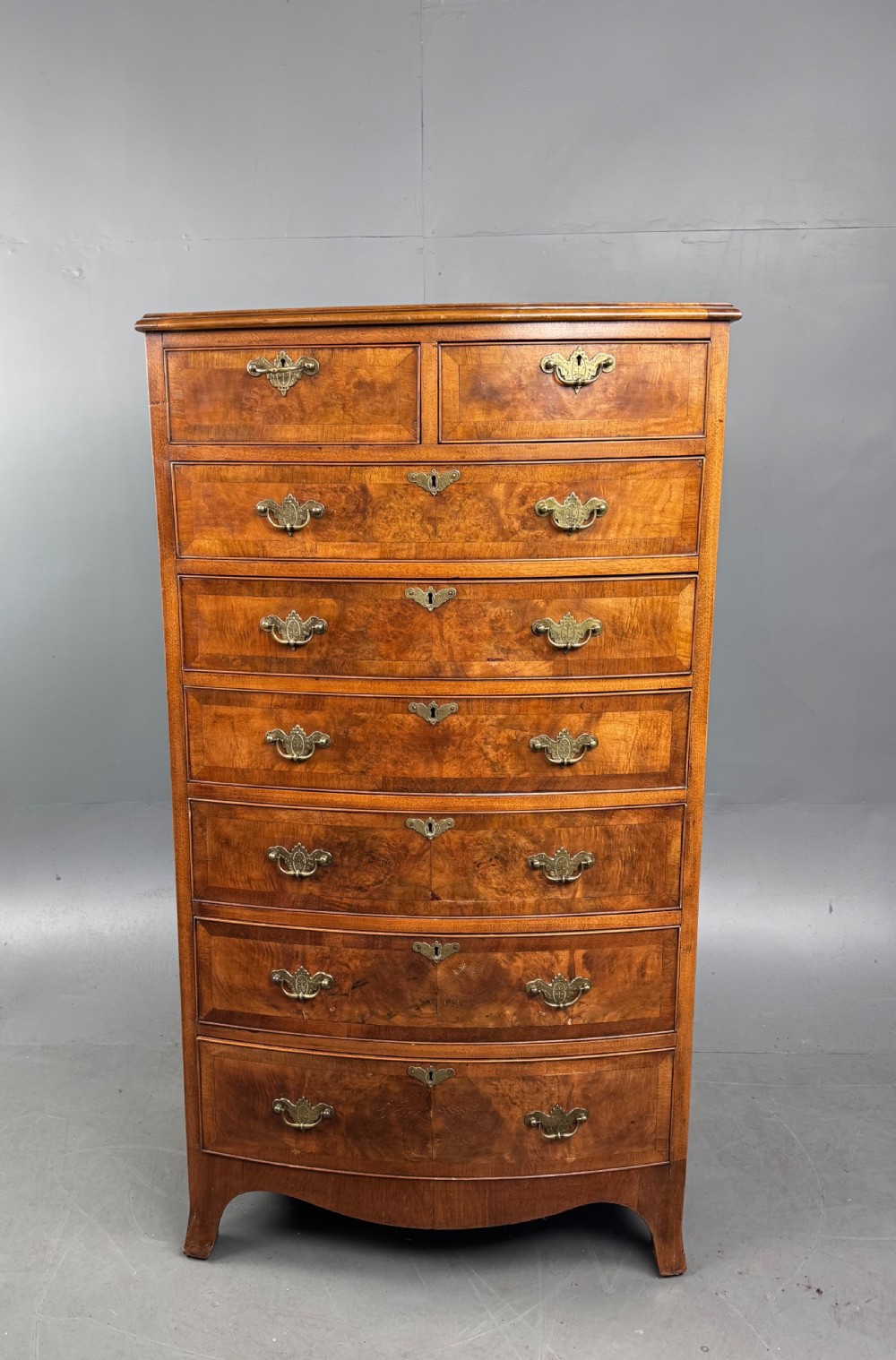 Walnut Bowfront chest of drawers 