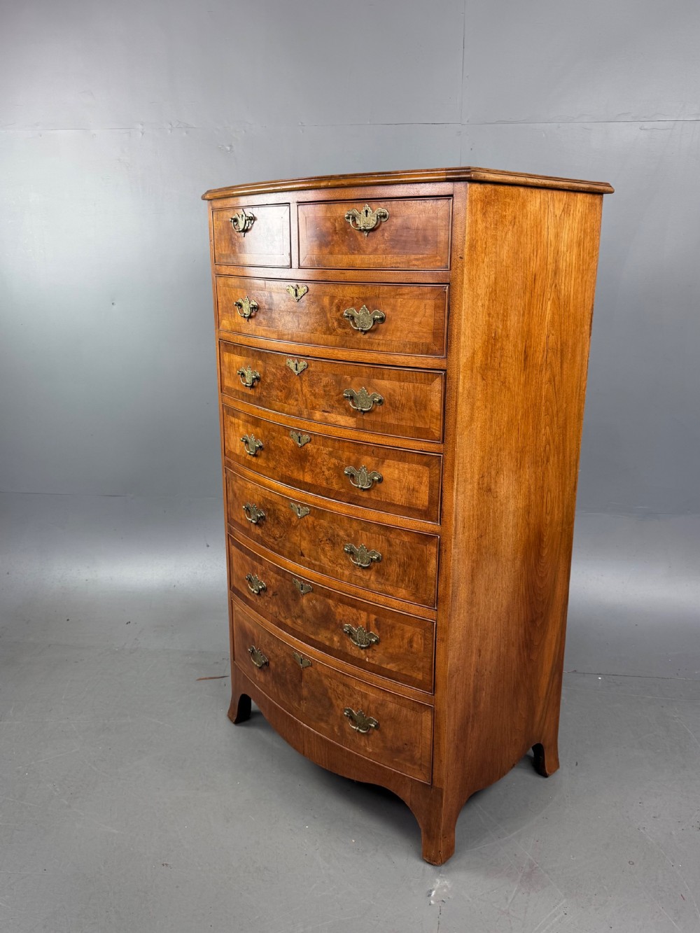 Walnut Bowfront chest of drawers  View II