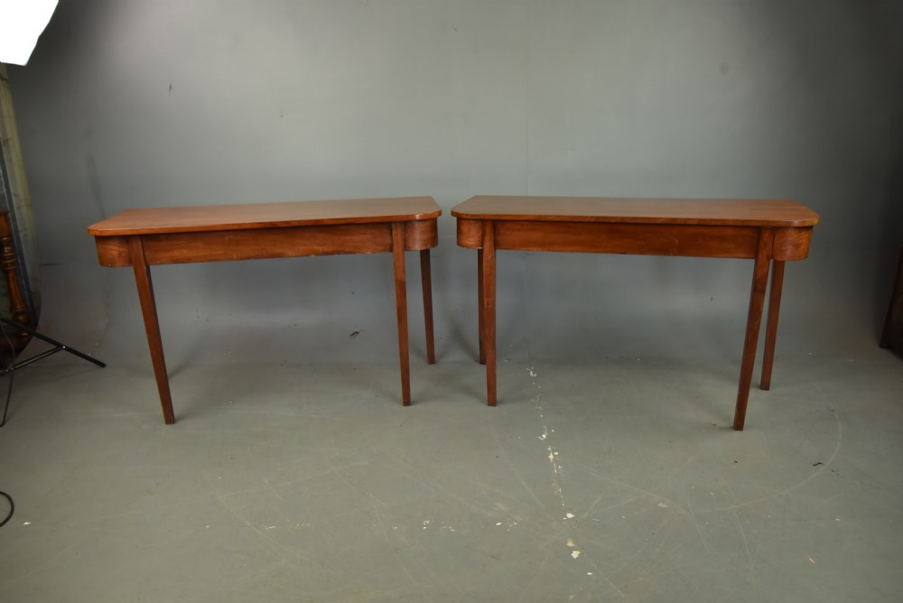 Pair of Georgian mahogany D end console tables