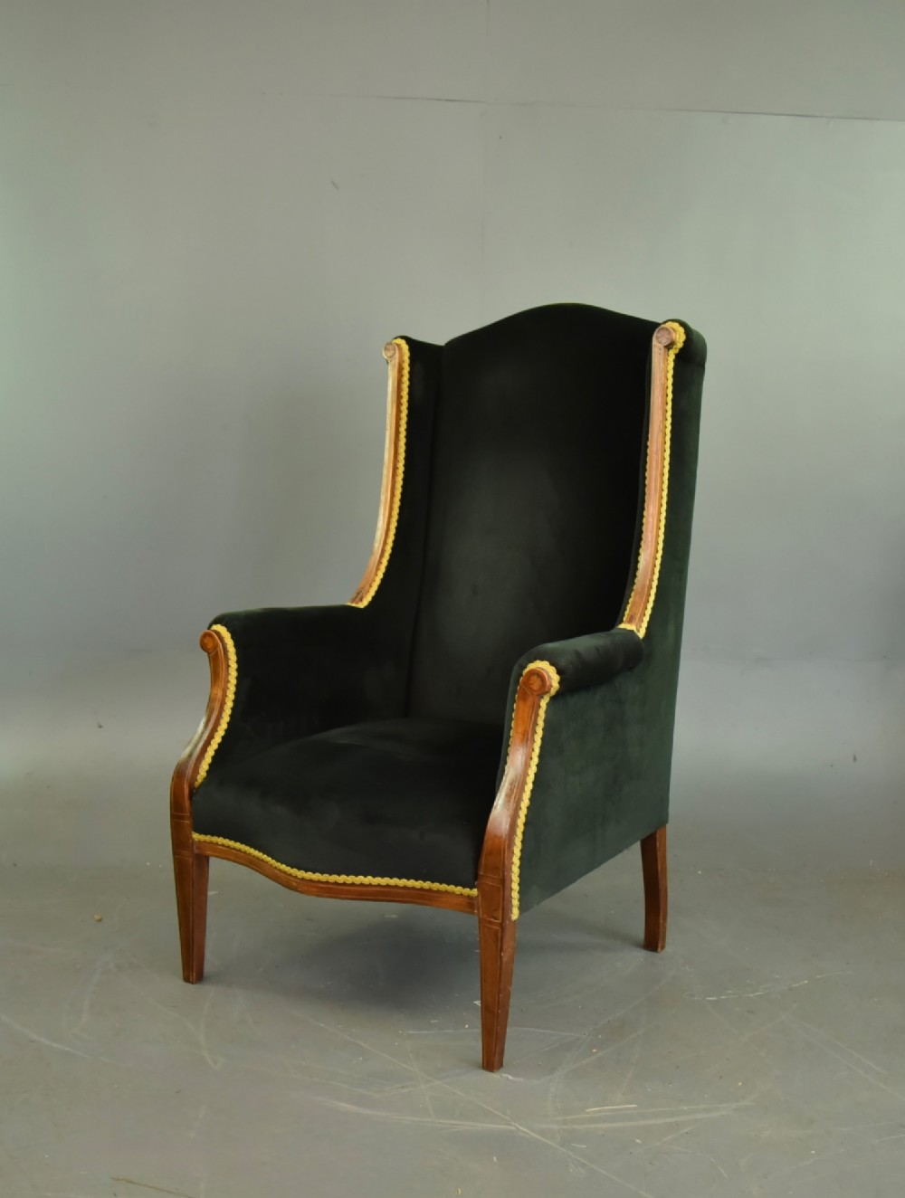 Edwardian mahogany inlaid wing arm chair