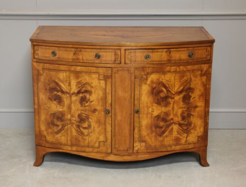 A 19th Century Bow Fronted Satinwood Side Cabinet