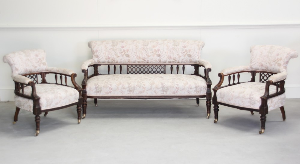 A Victorian Walnut salon three piece suite.